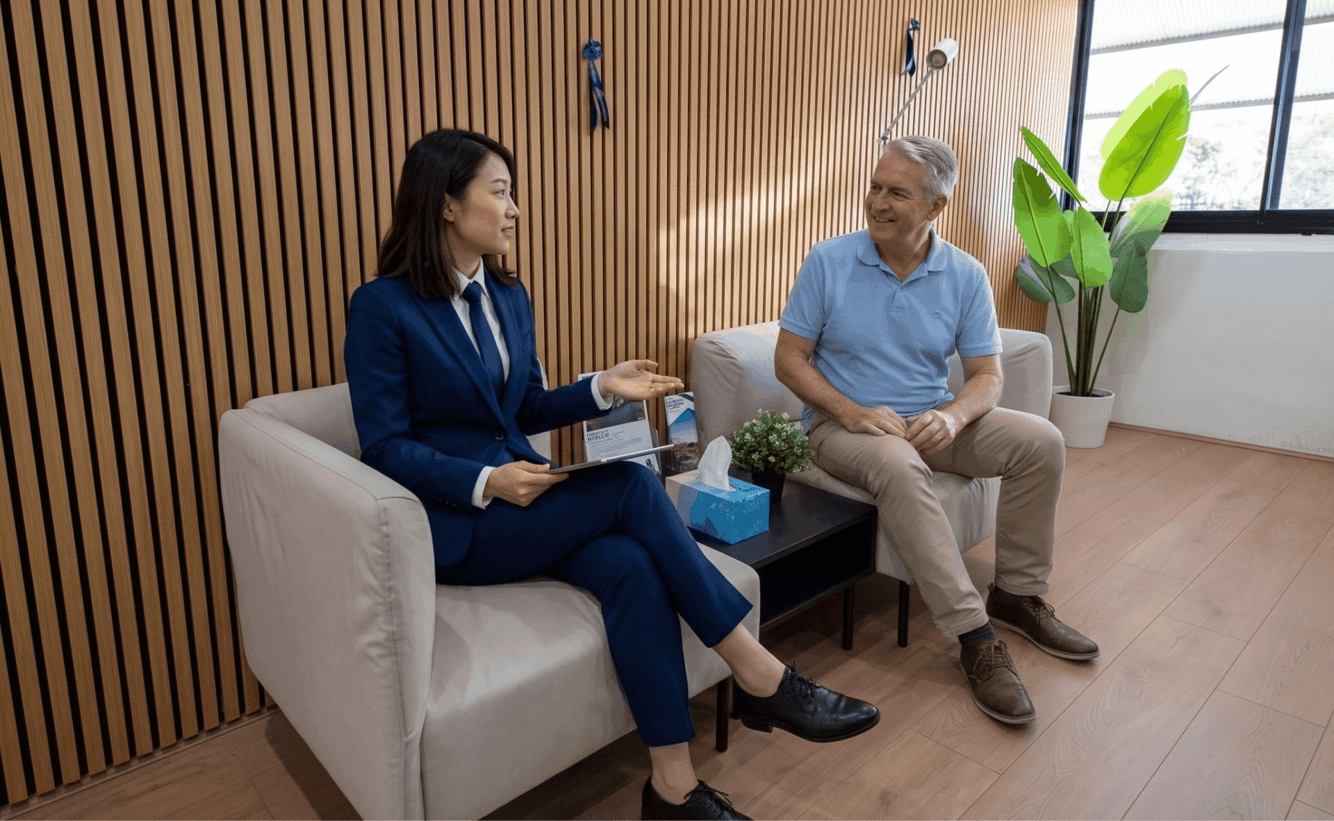 A BlueRibbon agent in conversation with a client